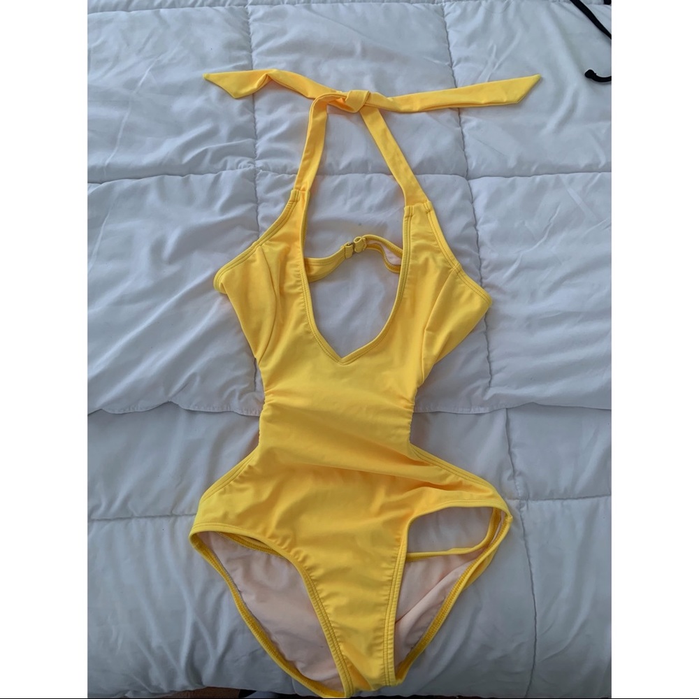 Brand new mint swim one piece. NEVER WORN, triedon